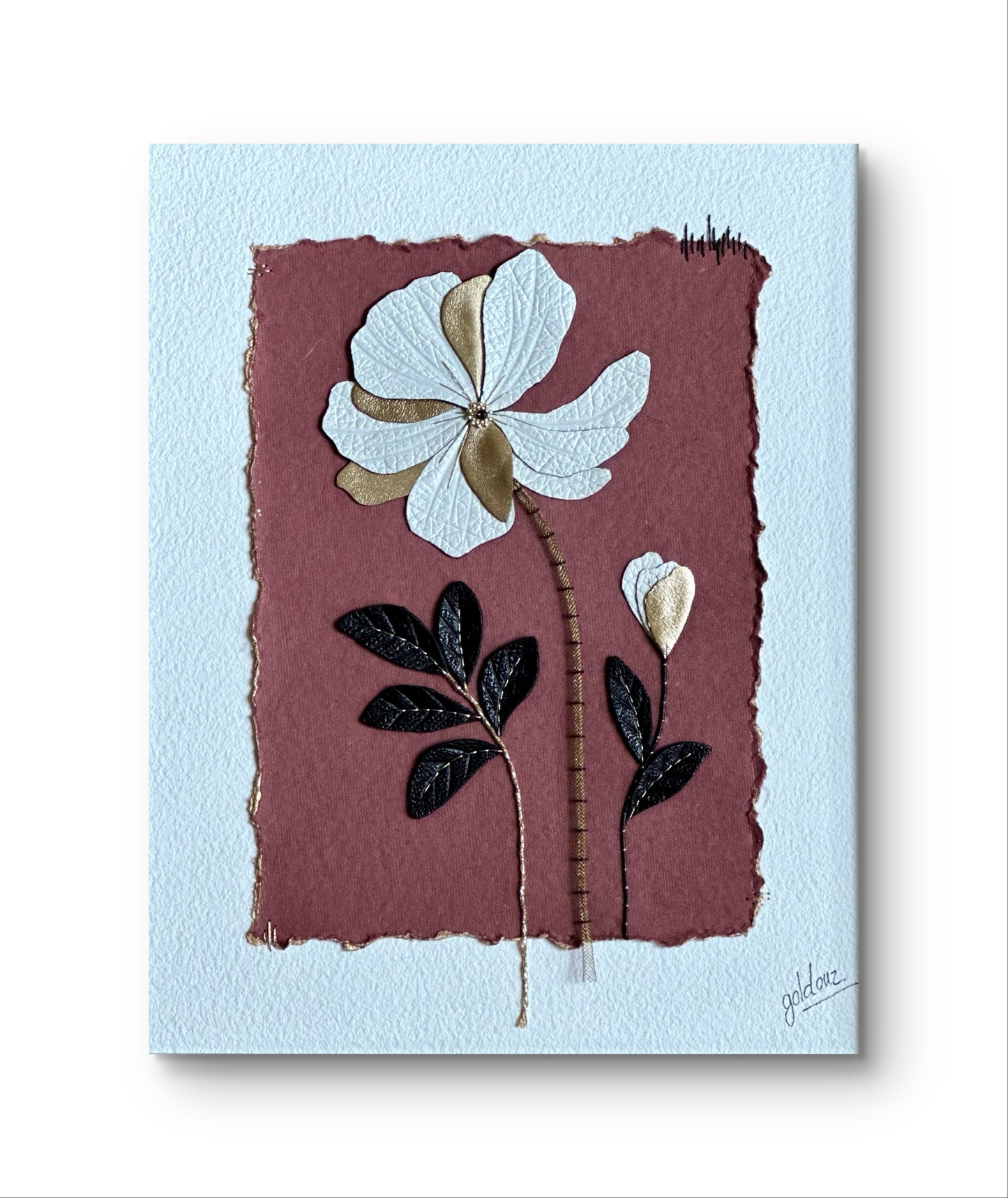 Embroidered picture with leather