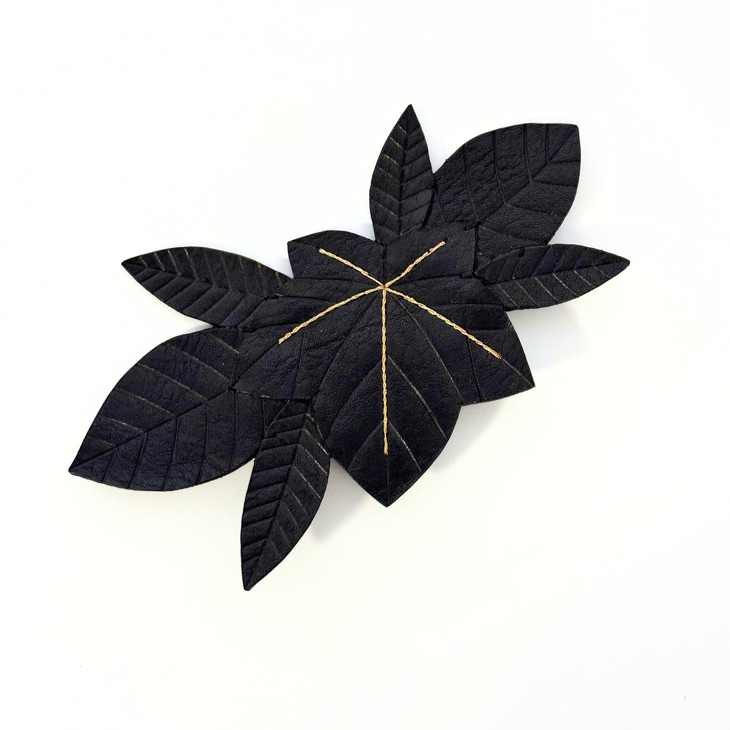 Leather brooch