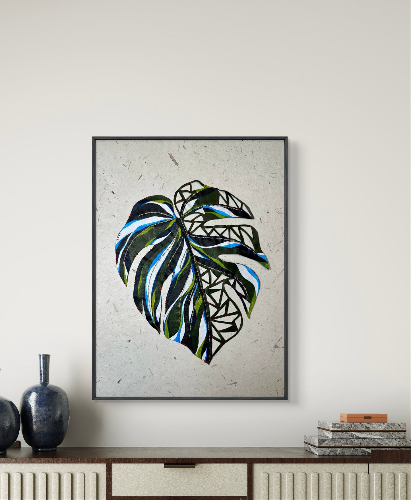 Embroidered picture with leather