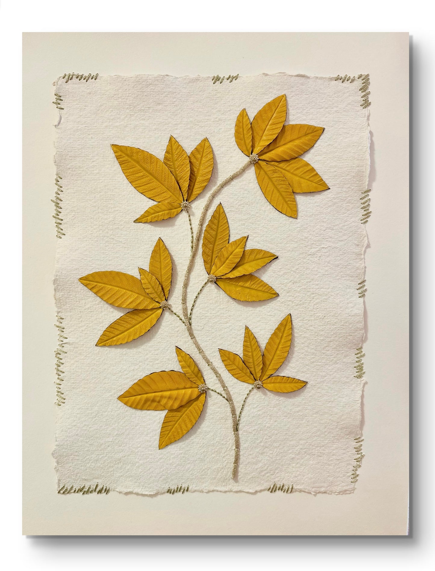 Embroidered picture with leather