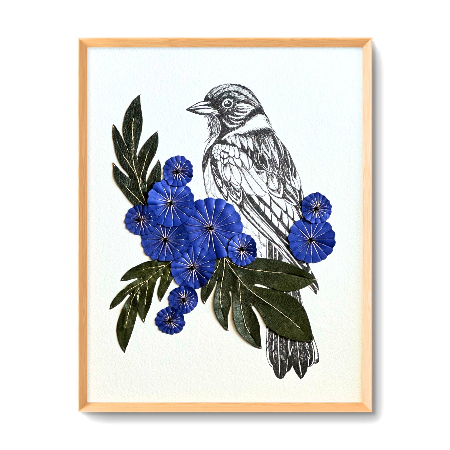 Embroidered picture with leather
